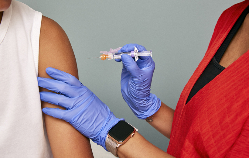patient receiving shot in arm