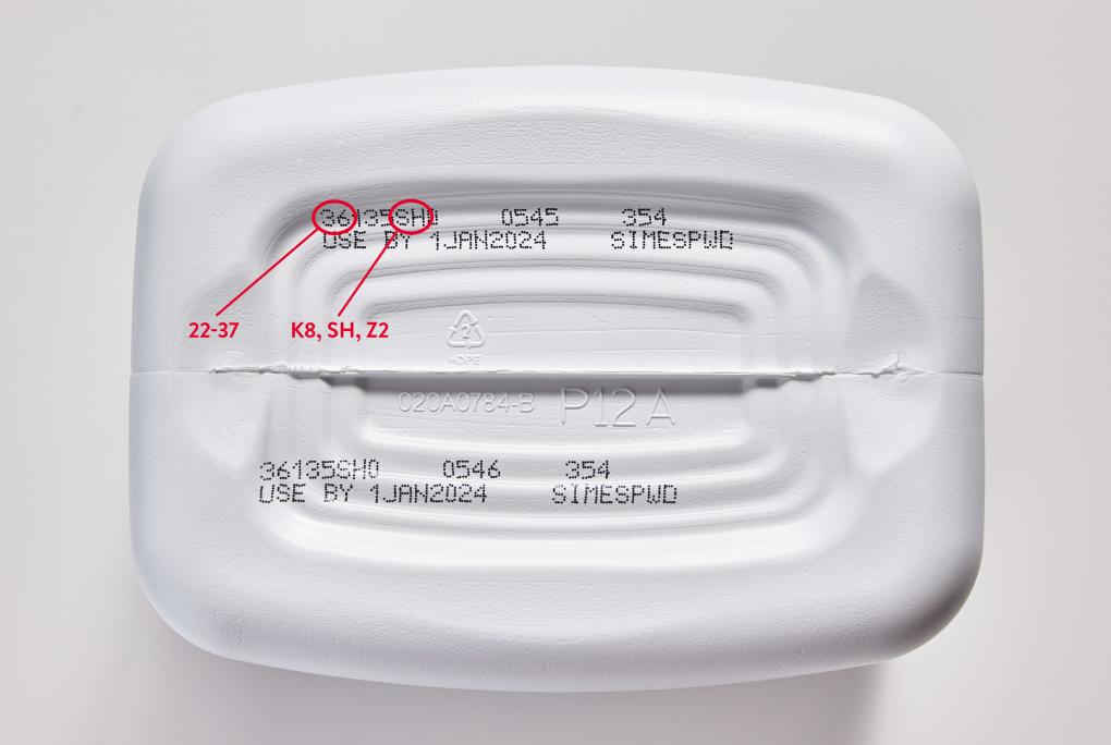 bottom of infant formula container showing lot number