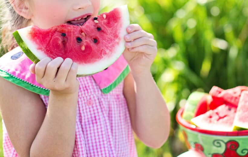 girl eating watermelon